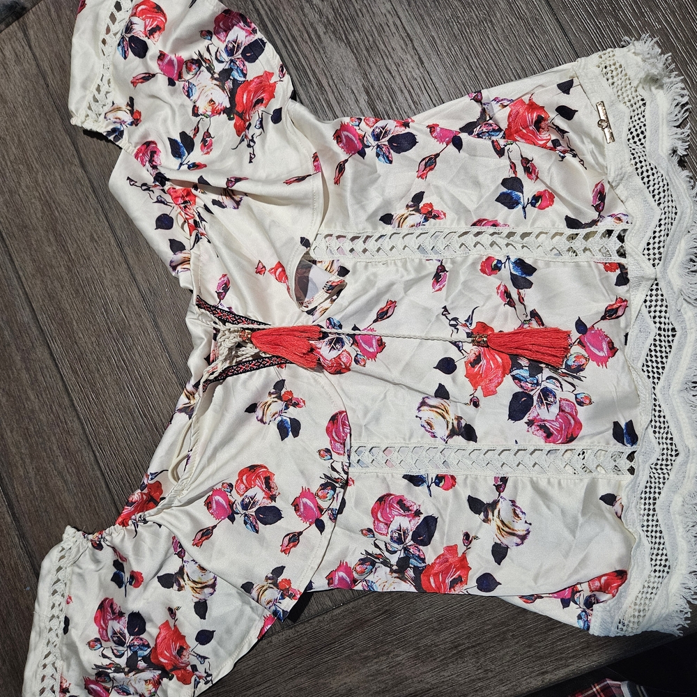White Ruffled Blouse with Flutter Sleeves and Tie Front